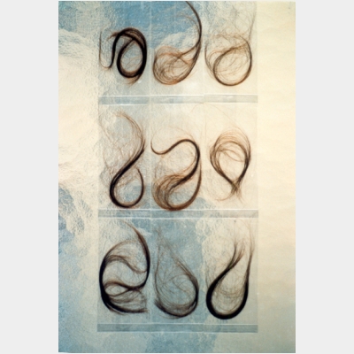 Haare in Zellophantuete-rotbraun